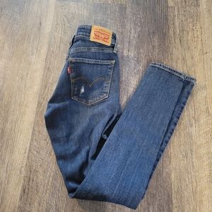 Levis 711 distressed jeans..AD